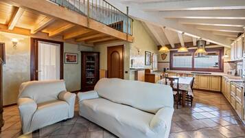 Basic Apartment, 2 Bedrooms | Living area | 30-inch TV with digital channels