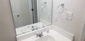 Hair dryer, towels, soap, shampoo