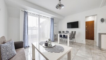 Apartment (34 ŻAGIEL) | Living area | Flat-screen TV