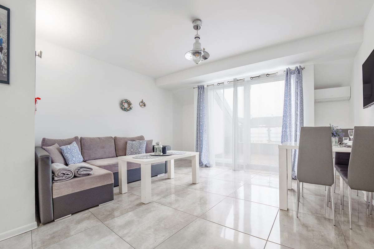 Apartamento (34 ŻAGIEL) | Zona de estar | Una televisión de pantalla plana