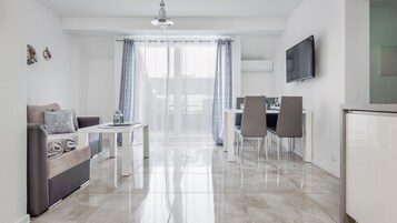 Apartamento (34 ŻAGIEL) | Área de estar | TV de tela plana
