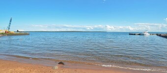 All-New Condo Steps from the Beach