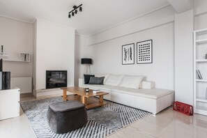 Standard Apartment | Living area | 43-inch Smart TV with digital channels, TV