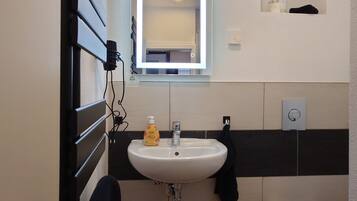 Hair dryer, towels, soap, shampoo