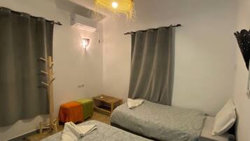 Blackout drapes, free WiFi, bed sheets