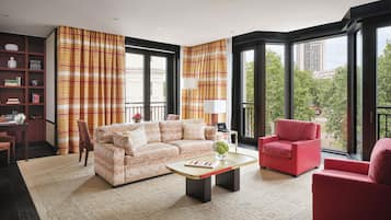 Grand Premier Park Suite, 1 King Bed | Living area | 35-inch LED TV with digital channels, toys, printers