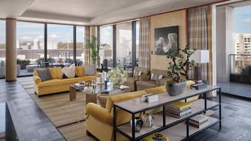 The Peninsula Suite, 1 King Bed | Living area | 35-inch LED TV with digital channels, toys, printers