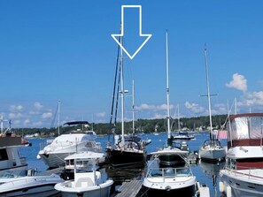 A marina with various boats docked. - WindSong: A charming 3-bedroom retreat in Boothbay Harbor, ME, near waterfront views. (Boothbay Harbor)