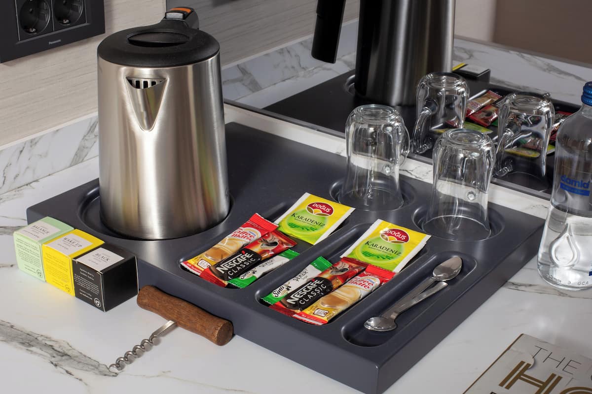 Mini-fridge, stovetop, coffee/tea maker, electric kettle