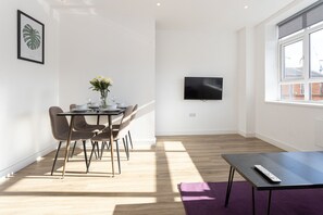 Business-Apartment | Wohnbereich | Flachbildfernseher