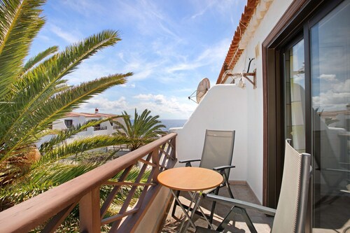 Vacation Apartment 'Amarilla Bay' with Sea View, Shared Pool and Wi-Fi