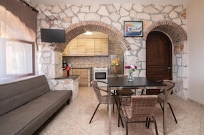 Luxe villa | Woonruimte | Een flatscreentelevisie