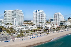 On the beach, sun-loungers, beach towels - The Luxurious W hotel Residence Beachfront Condo Oasis (Fort Lauderdale)