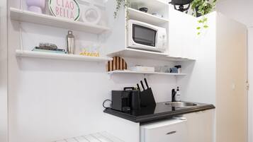 Fridge, microwave, coffee/tea maker, toaster