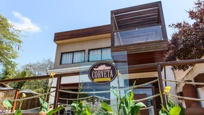A modern building with a sign that reads "CORVETA".
