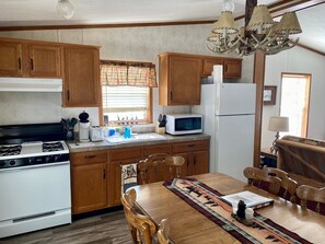 Fridge, microwave, oven, stovetop - A peaceful Northwoods cottage with direct trail access. (Athelstane)