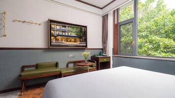 Premium bedding, down comforters, memory foam beds, free minibar