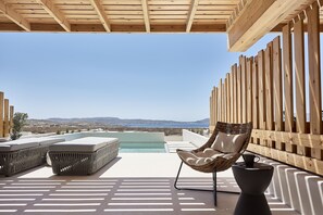 In-room safe, desk, laptop workspace, blackout curtains - Cave Suites  (Milos)