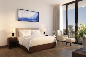 A hotel room with a large bed, two bedside tables, a chair, a large window, and a painting on the wall. - Ascott Oakwood HA Long (Ha Long)