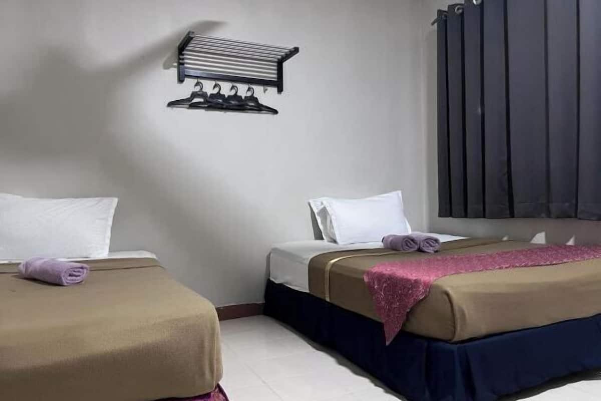 Laptop workspace, blackout curtains, free WiFi, bed sheets