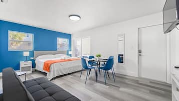 1 bedroom, desk, iron/ironing board, travel crib