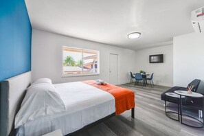 1 bedroom, desk, iron/ironing board, travel crib