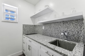 Microwave, stovetop, coffee/tea maker, toaster