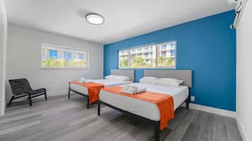 1 bedroom, desk, iron/ironing board, travel crib