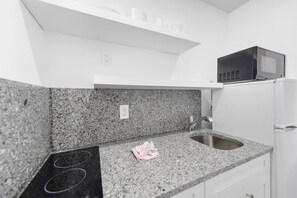 Microwave, stovetop, coffee/tea maker, toaster