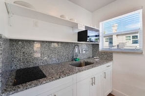 Fridge, microwave, coffee/tea maker, toaster