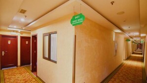 A hotel corridor with doors labeled 8401, 8402, and 8405. - Greentree Inn Beijing Chaoyang District Happy Valley Express Hotel (Beijing)