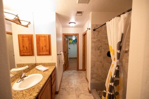 Shower, jetted bath, hair dryer, towels