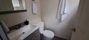 Hair dryer, towels, soap, shampoo