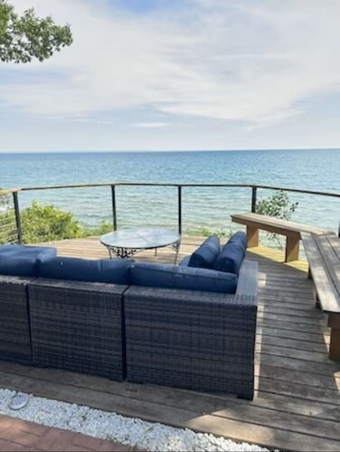 Rustic Log Cabin With A Private Beach.