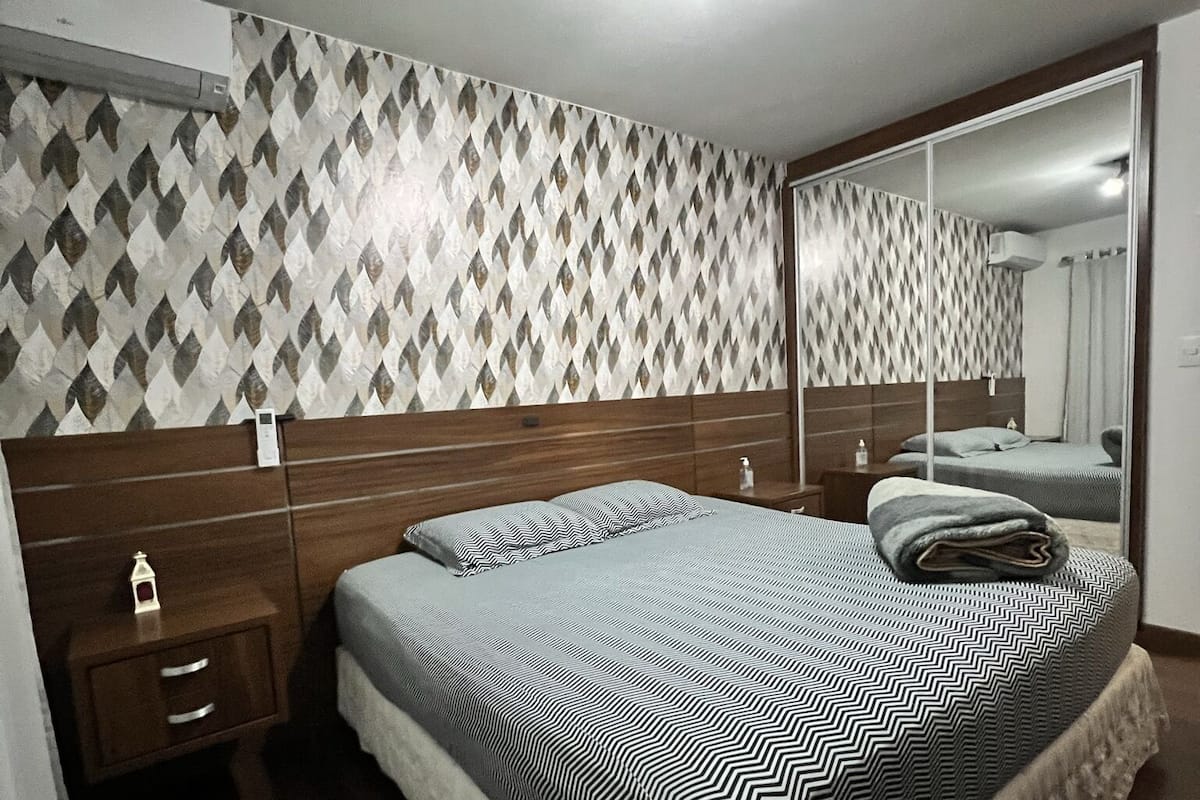 1 bedroom, premium bedding, blackout curtains, soundproofing