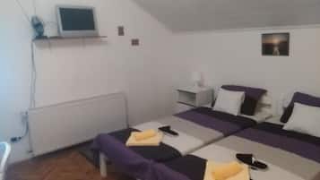 2 quartos, acesso à internet, roupa de cama