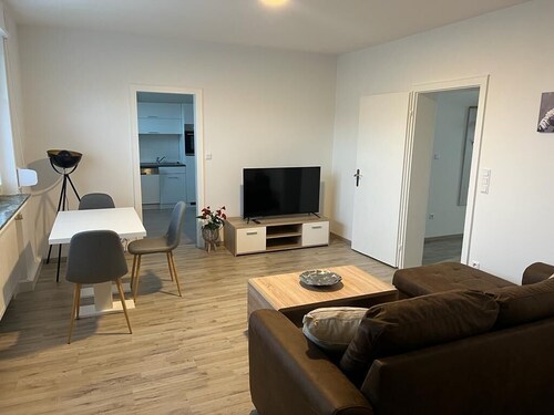 A modern renovated apartment with balcony terrace.