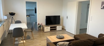 A modern renovated apartment with balcony terrace.