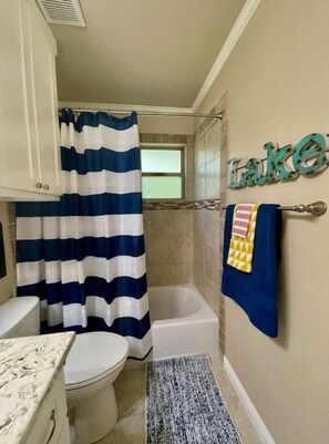 Hair dryer, towels, soap, toilet paper