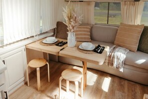 Luxury Room | Living area | 40-inch Smart TV with digital channels, TV - Finger Lakes Treehouse & Spa (Sodus)