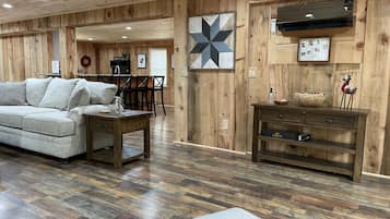 Deluxe Cottage, 1 King Bed, Non Smoking, Jetted Tub | Living area | 55-inch Smart TV with digital channels, TV, Netflix