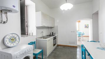 Fridge, stovetop, coffee/tea maker