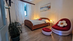 Apartamento | 2 quartos, ferros/tábuas de passar roupa, Wi-Fi de cortesia