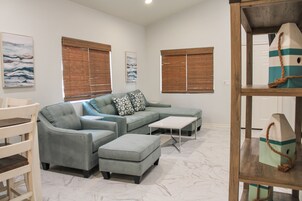 Deluxe Cabin, 3 Bedrooms, Lake View | Living area | 55-inch LED TV with satellite channels, TV