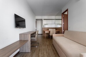 Premium Double Room, 1 Queen Bed with Sofa bed | Living room | 32-inch LCD TV with cable channels, TV, Netflix