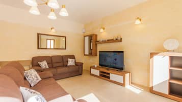 Standard House, Multiple Bedrooms, Refrigerator & Microwave (Nadurin, Gozitan villa 7 Bedr. & 2) | Living area | 21-inch flat-screen TV with cable channels