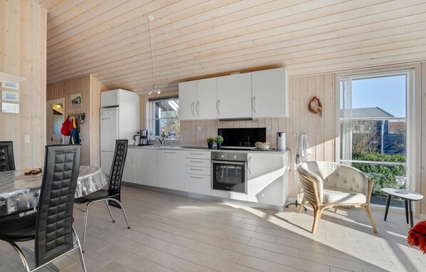 Fridge, stovetop, dishwasher, coffee/tea maker