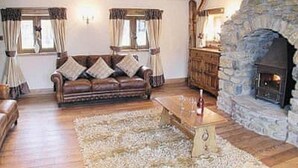 House, Multiple Beds | Living area - 3-bed House in Neath With Pool, hot tub and Sauna (Neath)