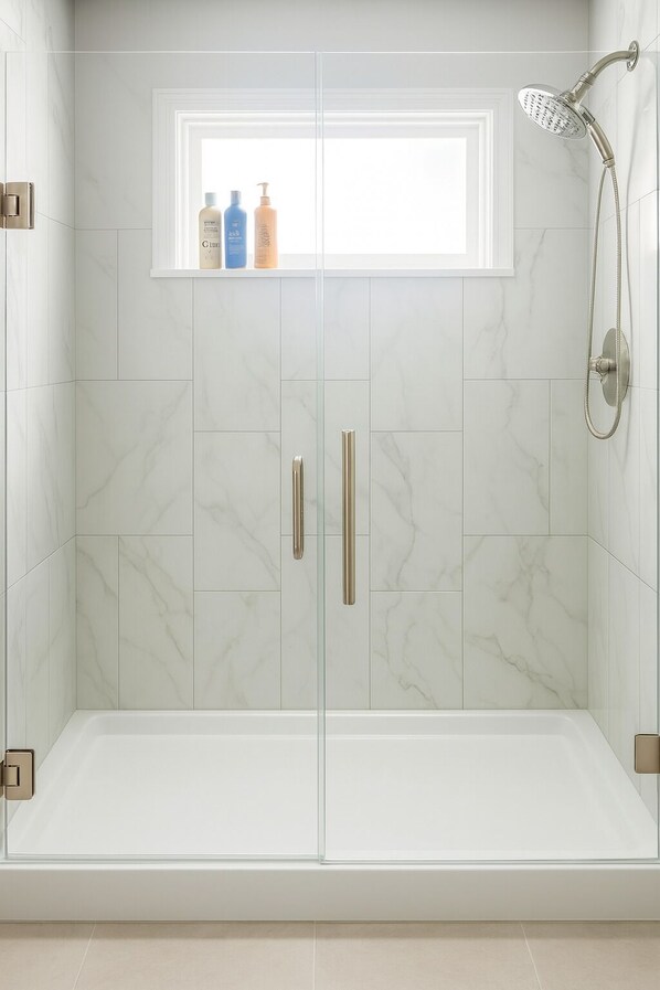 Shower, hair dryer, towels, soap
