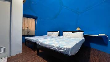 Desk, blackout drapes, bed sheets